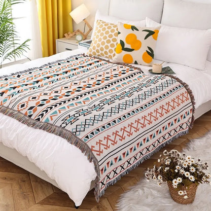 Geometric woven throw blanket with modern pattern ideal for sofa and decorative use