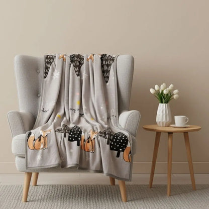 Soft flannel throw blanket featuring whimsical bear illustrations ideal for home decor and comfort