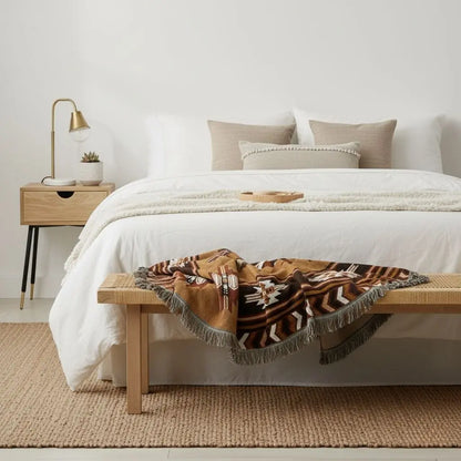 Bohemian throw blanket with tarot card moon design and traditional fringe edges for mystical home styling