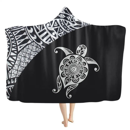 Hooded throw blanket in flannel with detailed turtle artwork and bohemian geometric accents