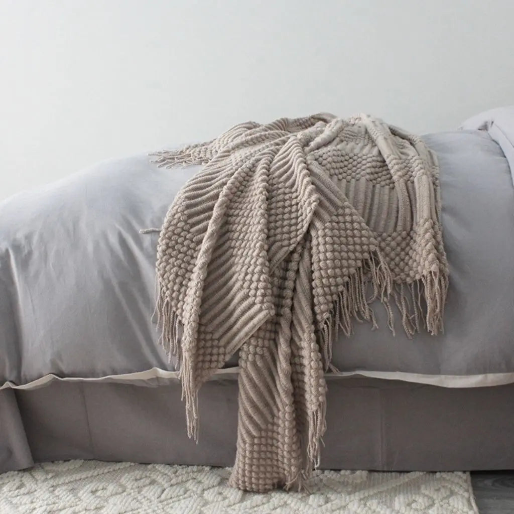 Soft fringe edge blanket perfect for couch lounging and reading comfort