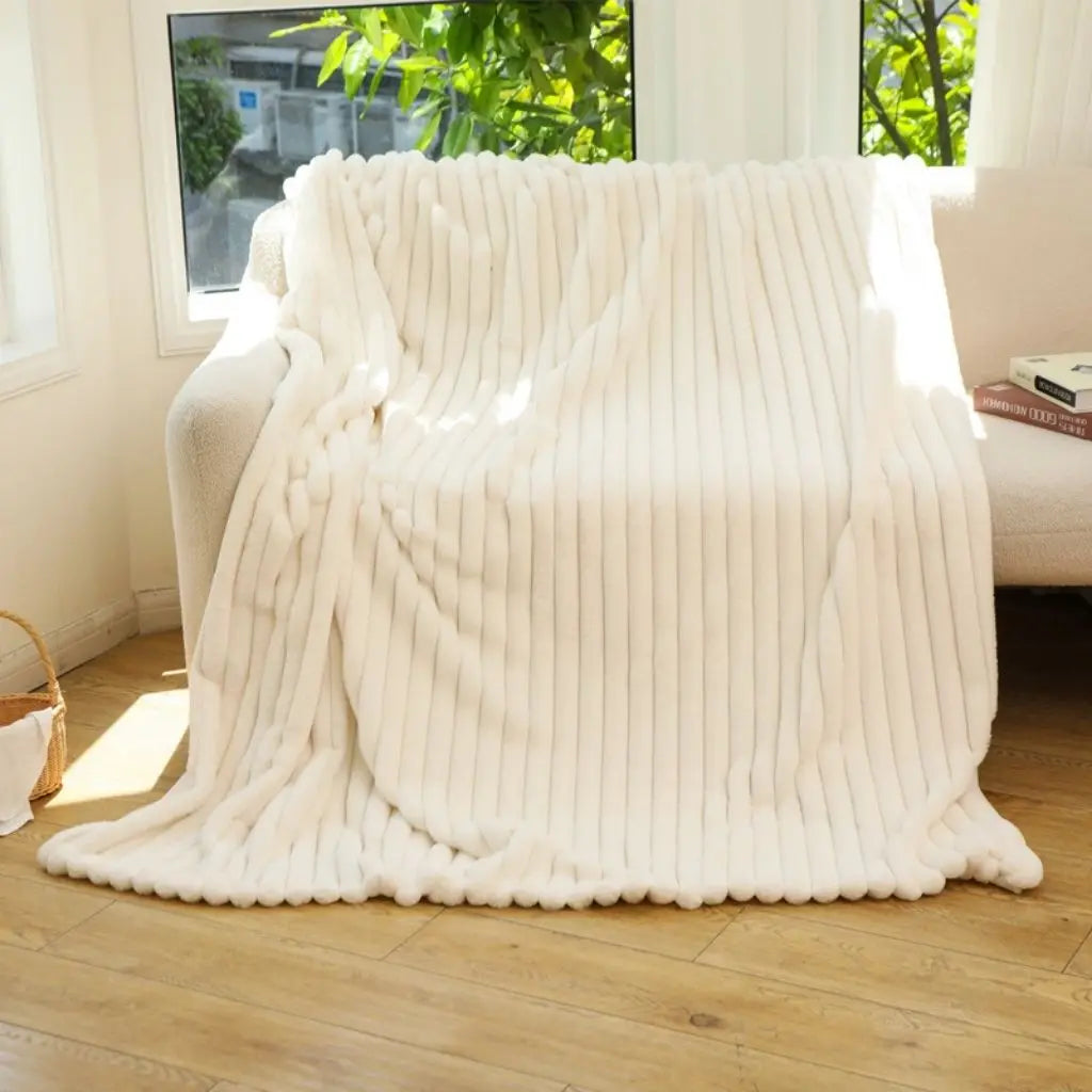 Faux rabbit fur blanket with striped jacquard weave for skin-friendly warmth