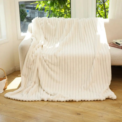 Faux rabbit fur blanket with striped jacquard weave for skin-friendly warmth