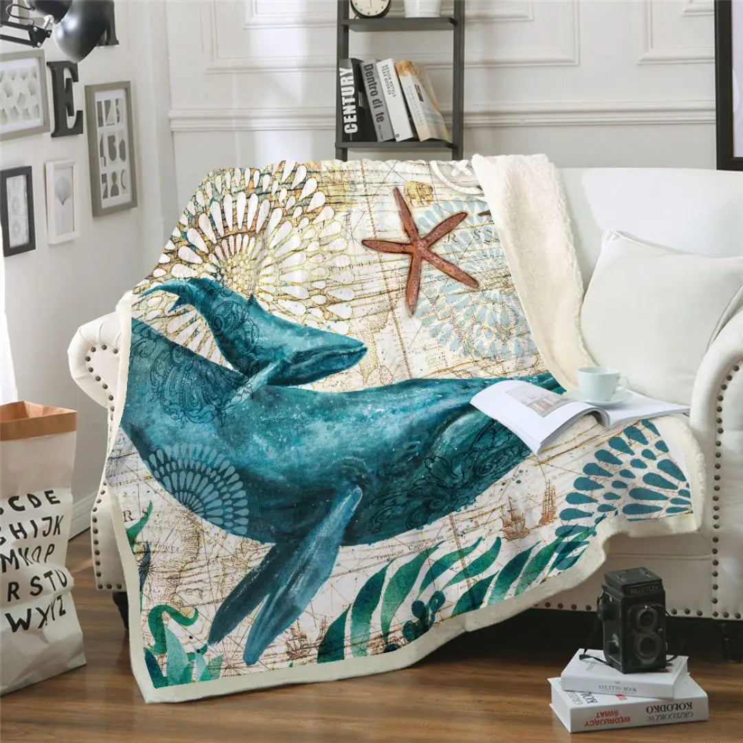 Nautical coral fleece throw with detailed ocean artwork and soft texture

