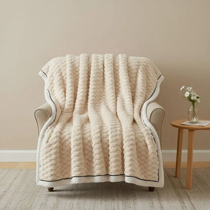 Velvet throw blanket draped on furniture displaying versatile use for sofas and lounge areas
