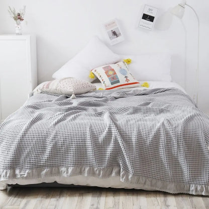 Textured cotton waffle blanket with decorative lace for sofa or bed use