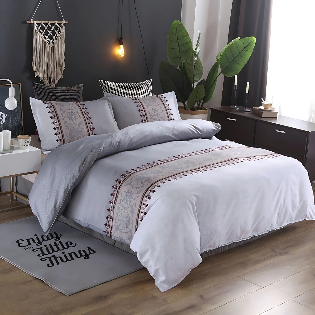 Bedroom duvet set showcasing bold floral border pattern with reactive printing for lasting color vibrancy