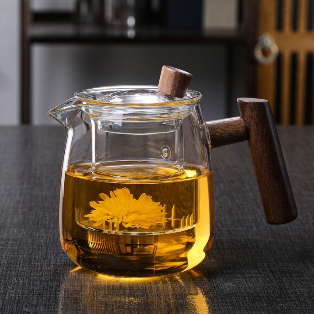 Elegant borosilicate glass tea kettle with transparent design ideal for stovetop brewing and tea service