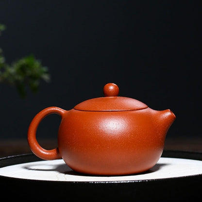 Complete red clay ceramic teapot set, handcrafted traditional design ideal for tea lovers and gift giving
