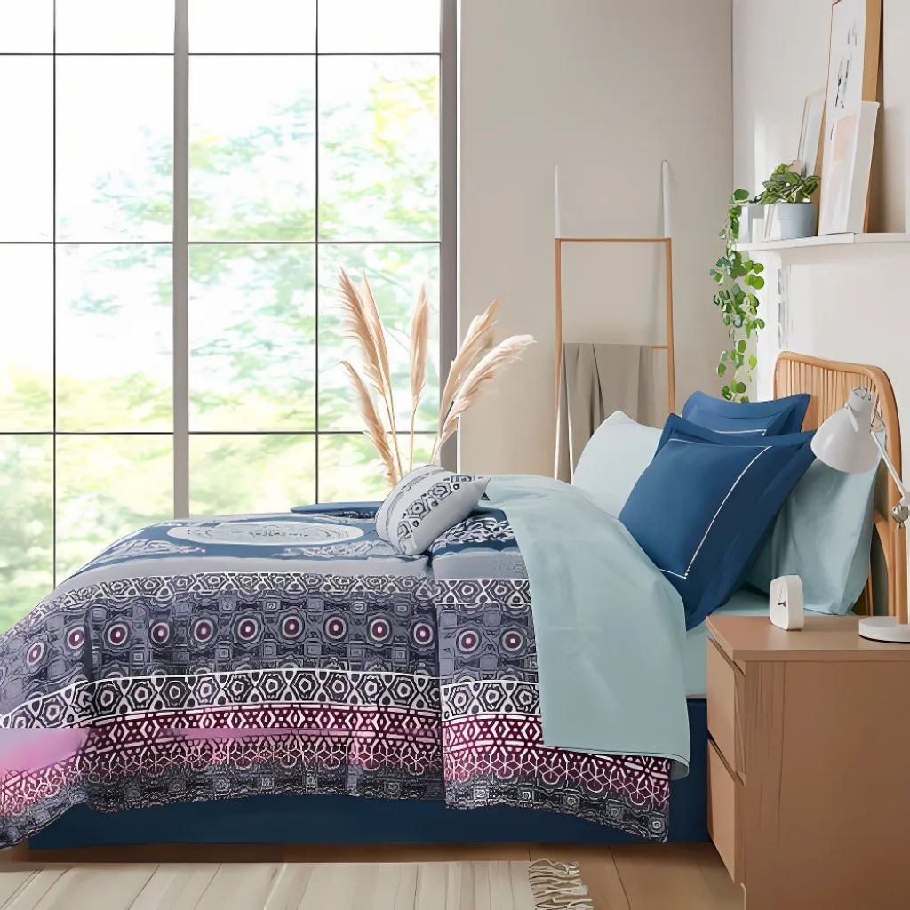 Navy teal purple medallion design on boho comforter displaying vibrant bohemian color palette for bedrooms