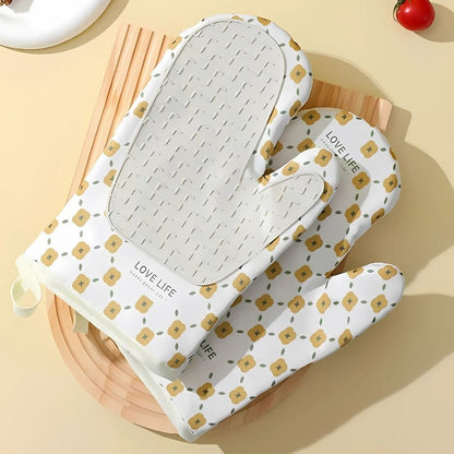 Cotton silicone oven mitts with floral design, heat resistant to 572°F for safe baking and cooking
