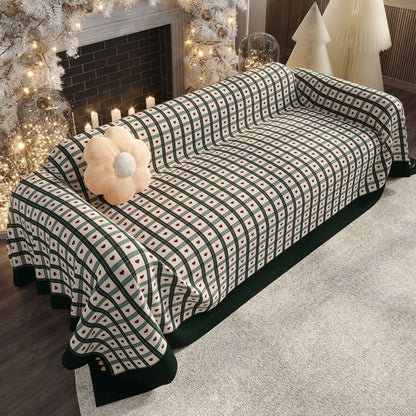 Festive chenille throw with holiday patchwork design on furniture