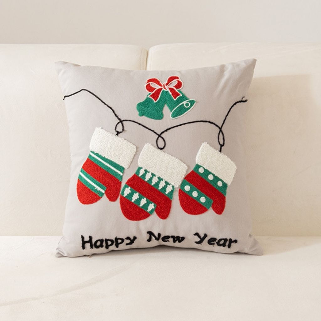 Christmas pillow cover with embroidered design on neutral background