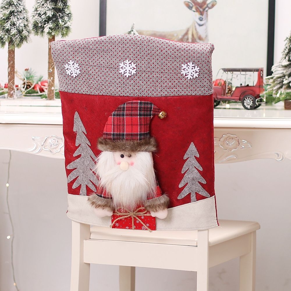 3D Santa chair cover in red soft cloth for holiday dining setup