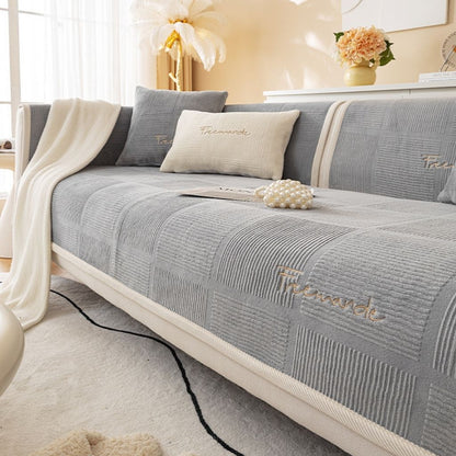 Soft flannel sofa cover with anti-slip backing for furniture protection and comfort
