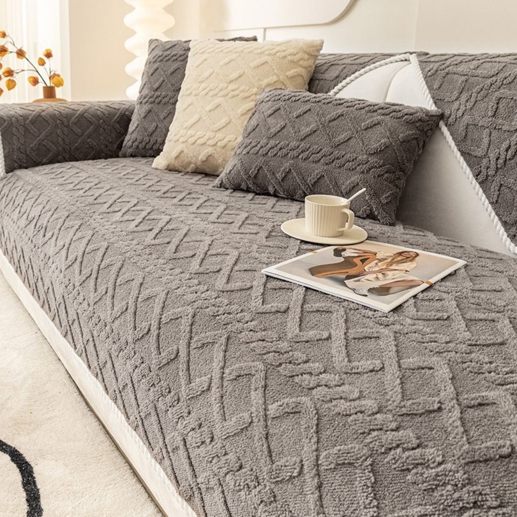  Plush geometric couch protector offering soft comfort for modern interior styling