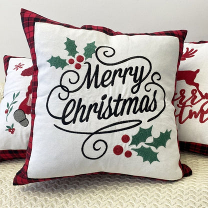 Festive pillow case with embroidered design and red checkered trim accent