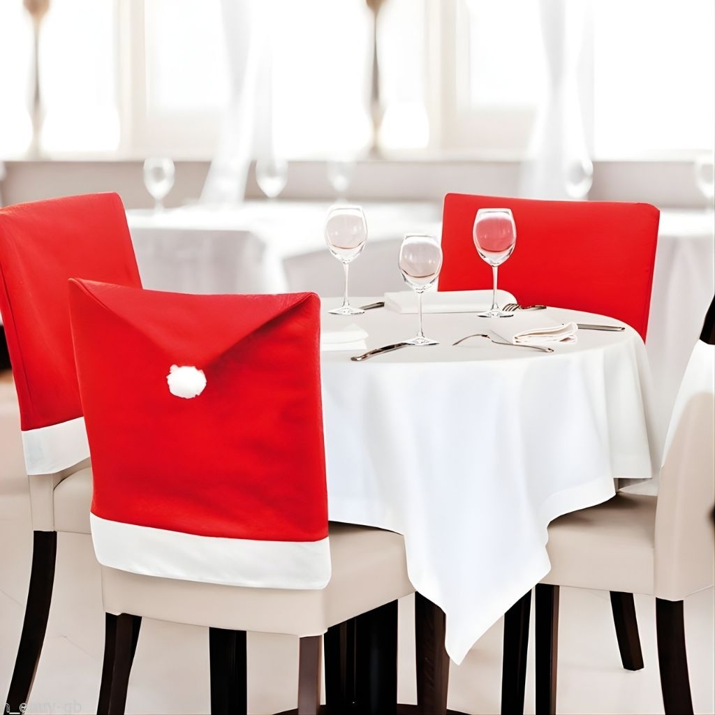 White snowman face chair cover with black top hat on wooden chair