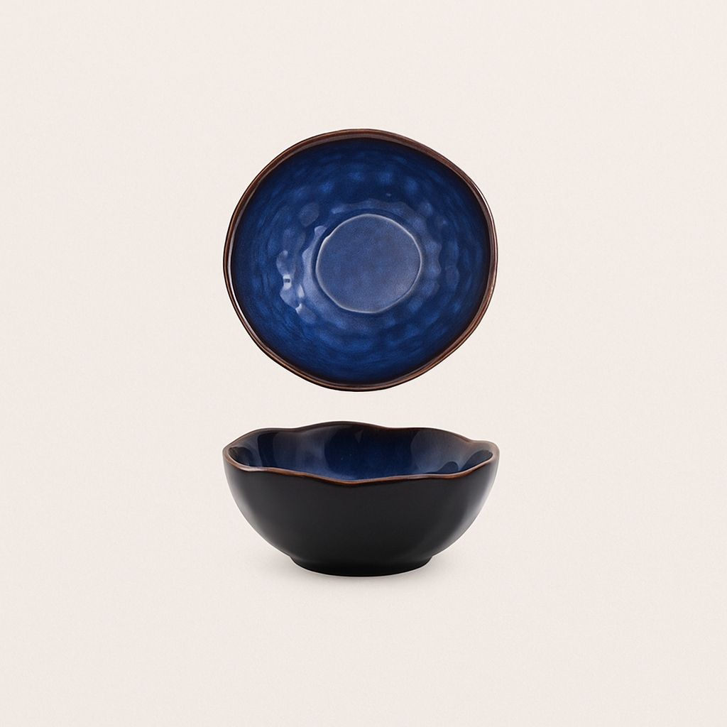 Handcrafted ceramic deep bowl with irregular artistic shape, perfect for modern dining and creative serving