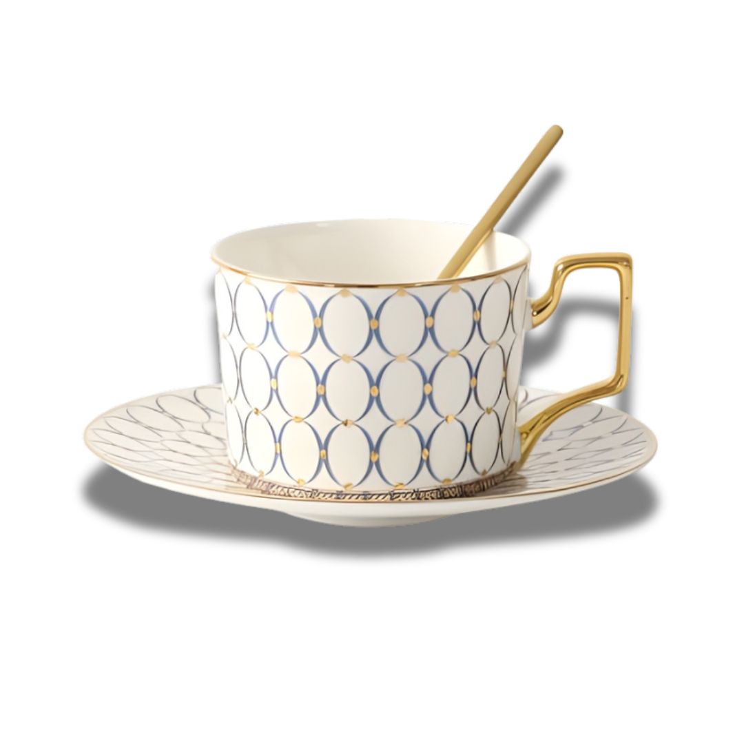 Top view of porcelain tea cup set with gold handle and matching saucer