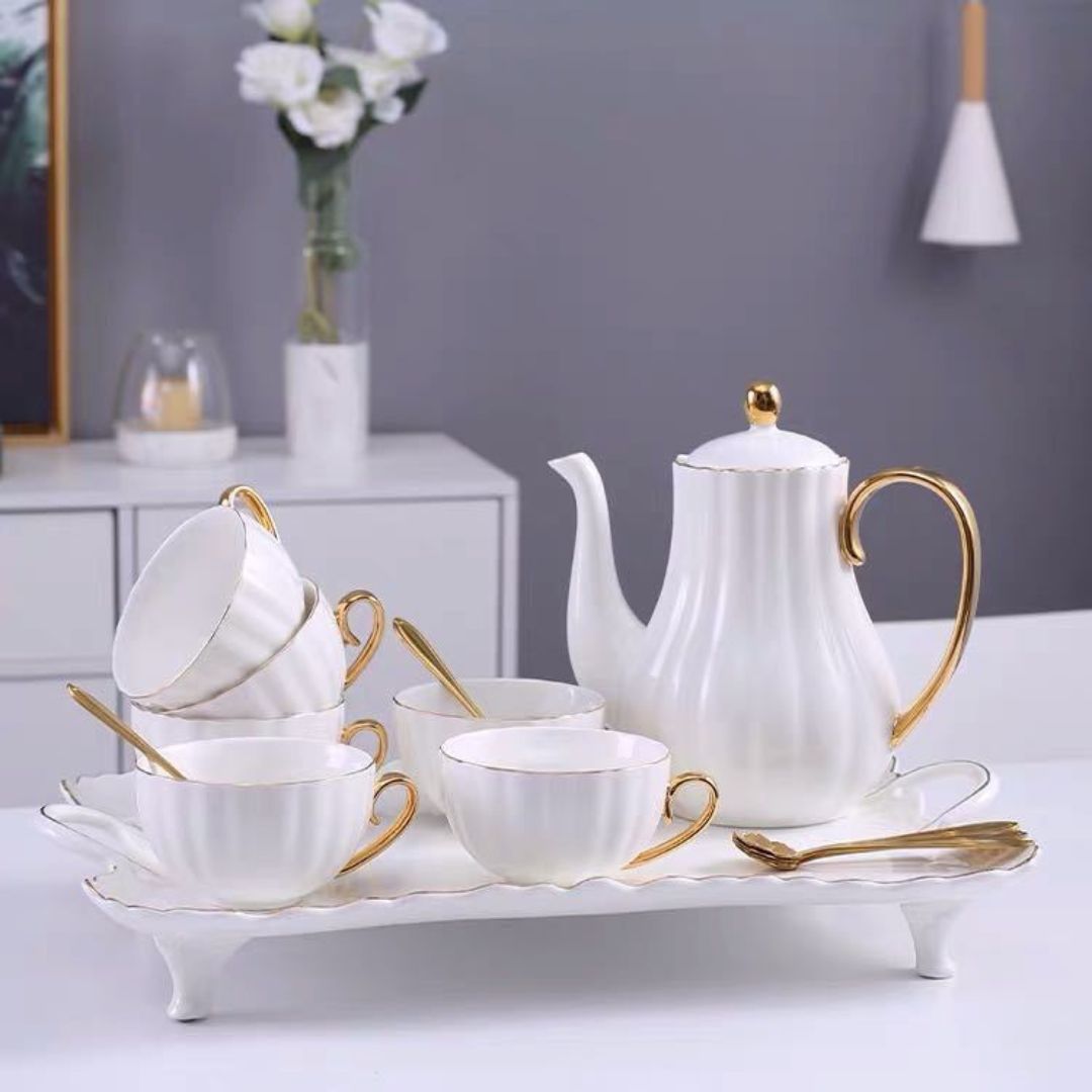  Pumpkin shaped ceramic tea cup with gold painted rim and matching saucer for afternoon tea service