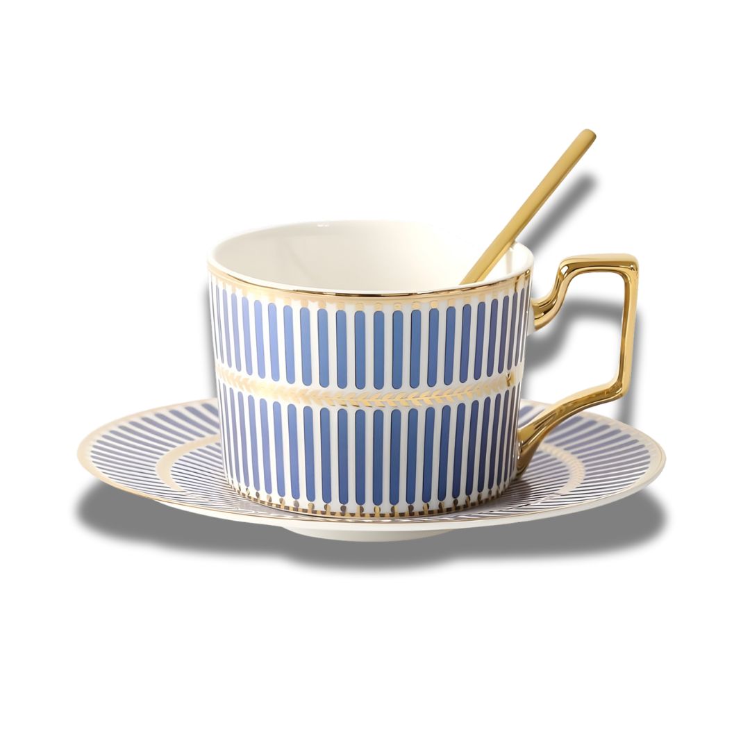 Porcelain cup with gold spoon and saucer featuring geometric border pattern