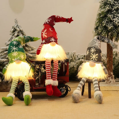Light up festive figure with pointed hat and warm internal glow