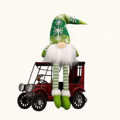 Light up Christmas gnome with soft glow sitting on shelf display