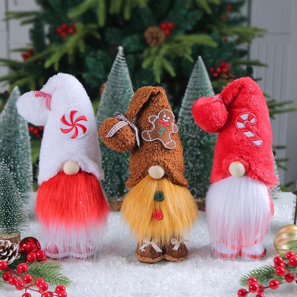 Faceless Christmas gnome with layered fabric body and gingerbread details front view