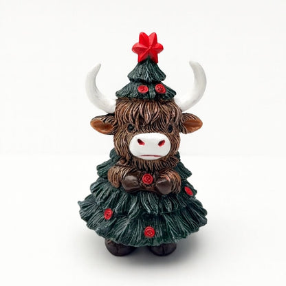 Resin highland cattle figurine with christmas tree outfit