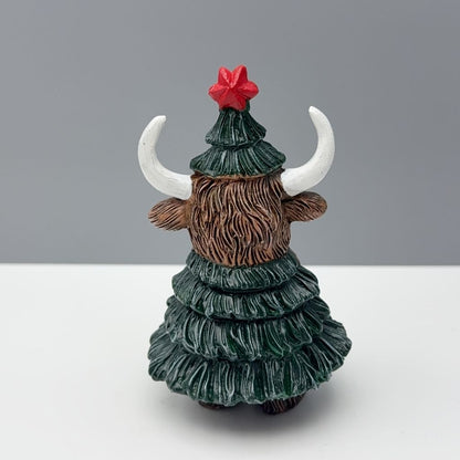 Highland cattle head ornament dressed in christmas tree outfit with decorative accents