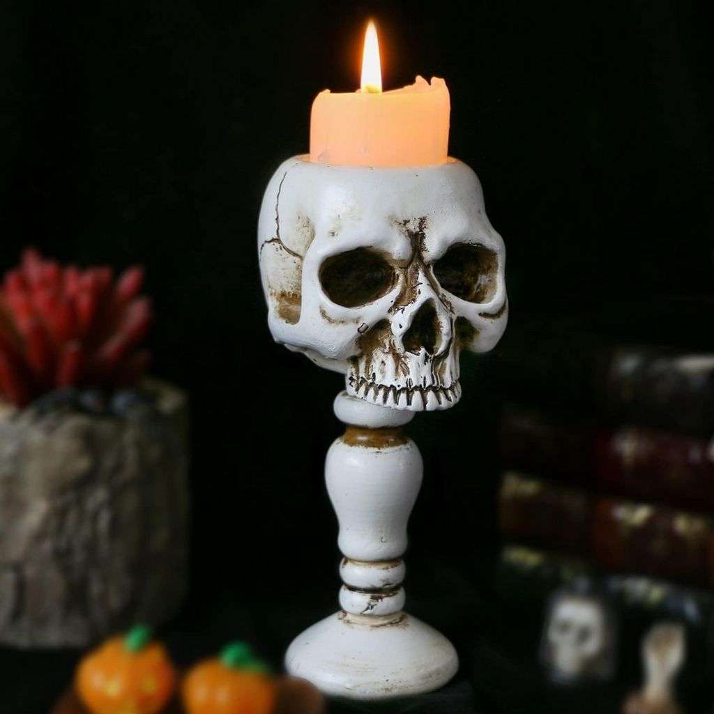 Gothic skull candle holder with elevated pedestal base  sturdy Halloween decor for standard candles