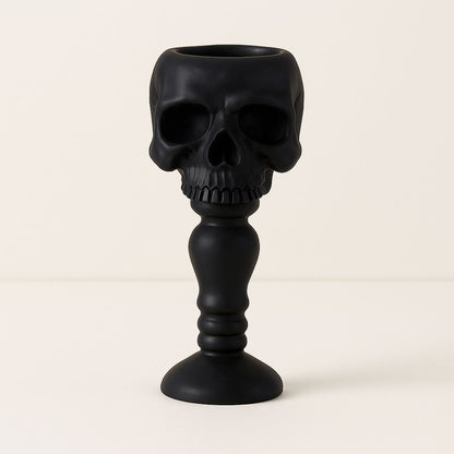 Textured resin skull candle holder side view - gothic Halloween decoration with detailed bone-like finish
