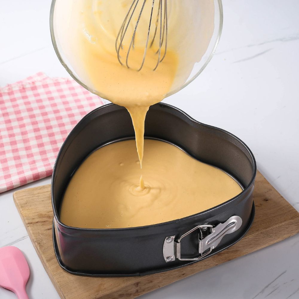 Mini heart shaped baking pan perfect for personal desserts and individual cake portions