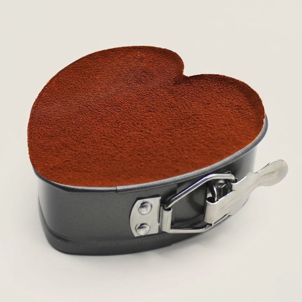Heart shaped steel baking mold with nonstick surface for even heat distribution and consistent results