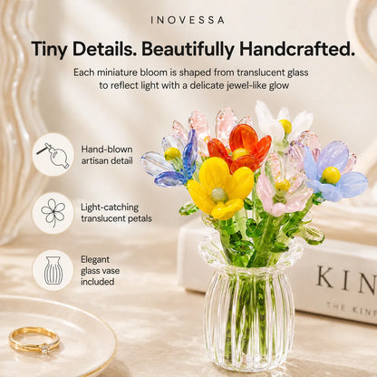 Glass flowers in a vase with INOVESSA branding and product features.
