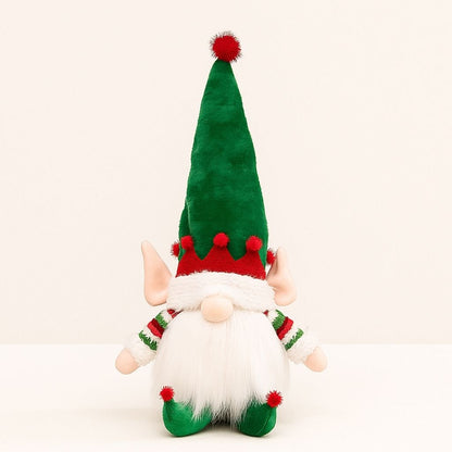 Light up gnome with red pointed hat and glowing white beard for Christmas table display