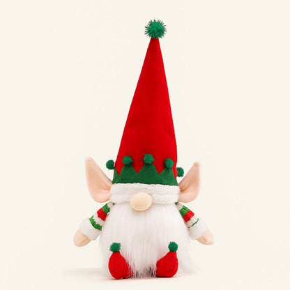 Illuminated gnome ornament with oversized ears and tall red hat on white background
