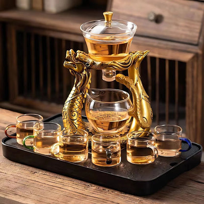 Semi-automatic glass tea brewing system with golden dragon phoenix stand for smooth tea separation and pouring


