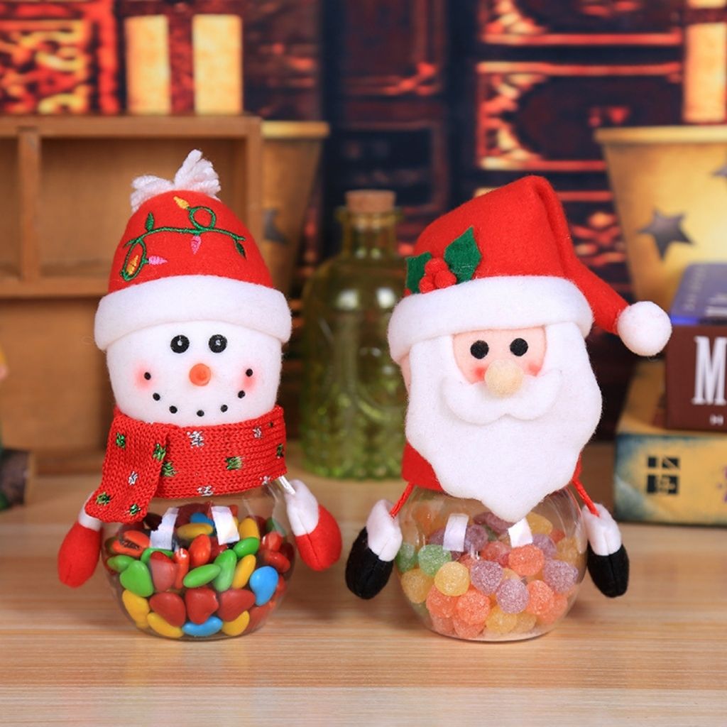 Decorative holiday candy holder with flannel character lid and glass jar base