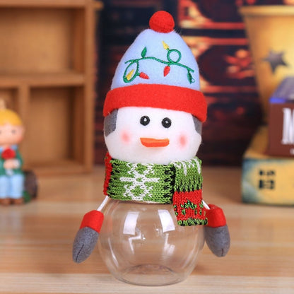 Holiday table decor candy jar with soft fabric character and visible treat storage