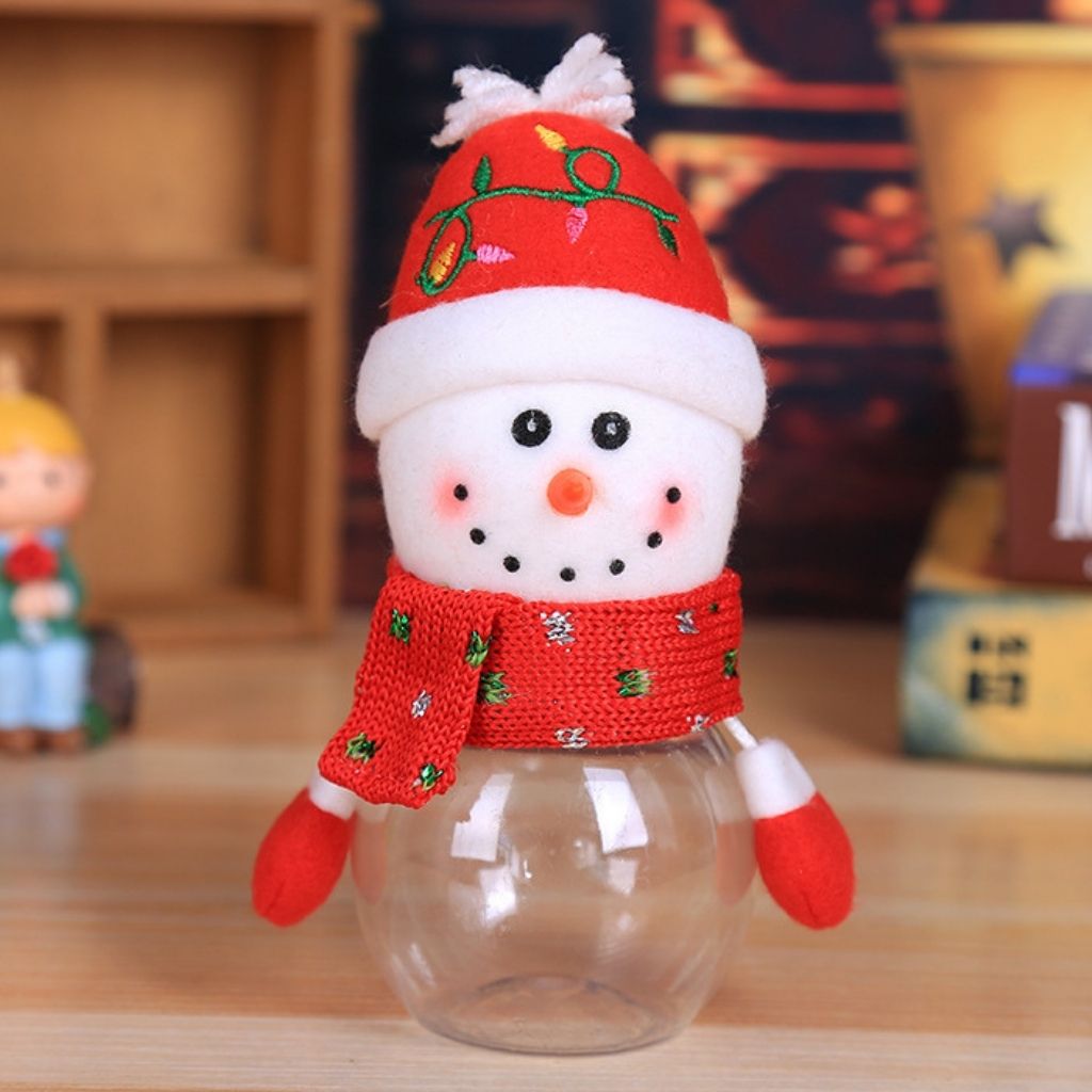 Reusable candy container with festive plush lid and clear base for party favors