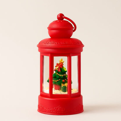 Miniature Christmas lantern light with illuminated festive scene in synthetic resin construction