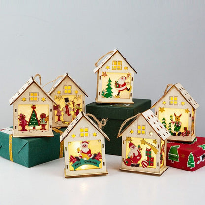 Set of decorative house-shaped lights with Christmas scenes on a light gray background