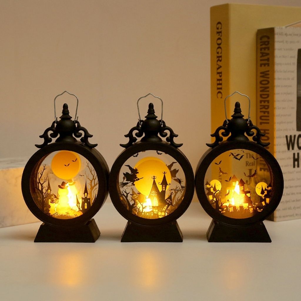 Retro Halloween lantern with clear panels showcasing glowing pumpkin witch castle themed cutout details