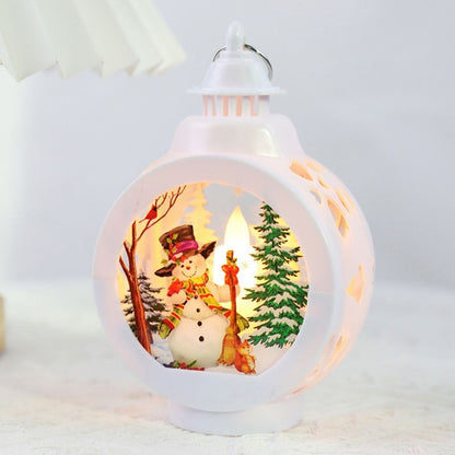 Cordless holiday lantern with winter scene inside transparent rounded casing