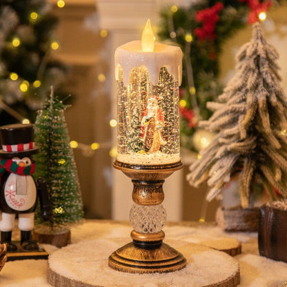Festive candle lantern featuring illuminated snowfall and winter landscape detail