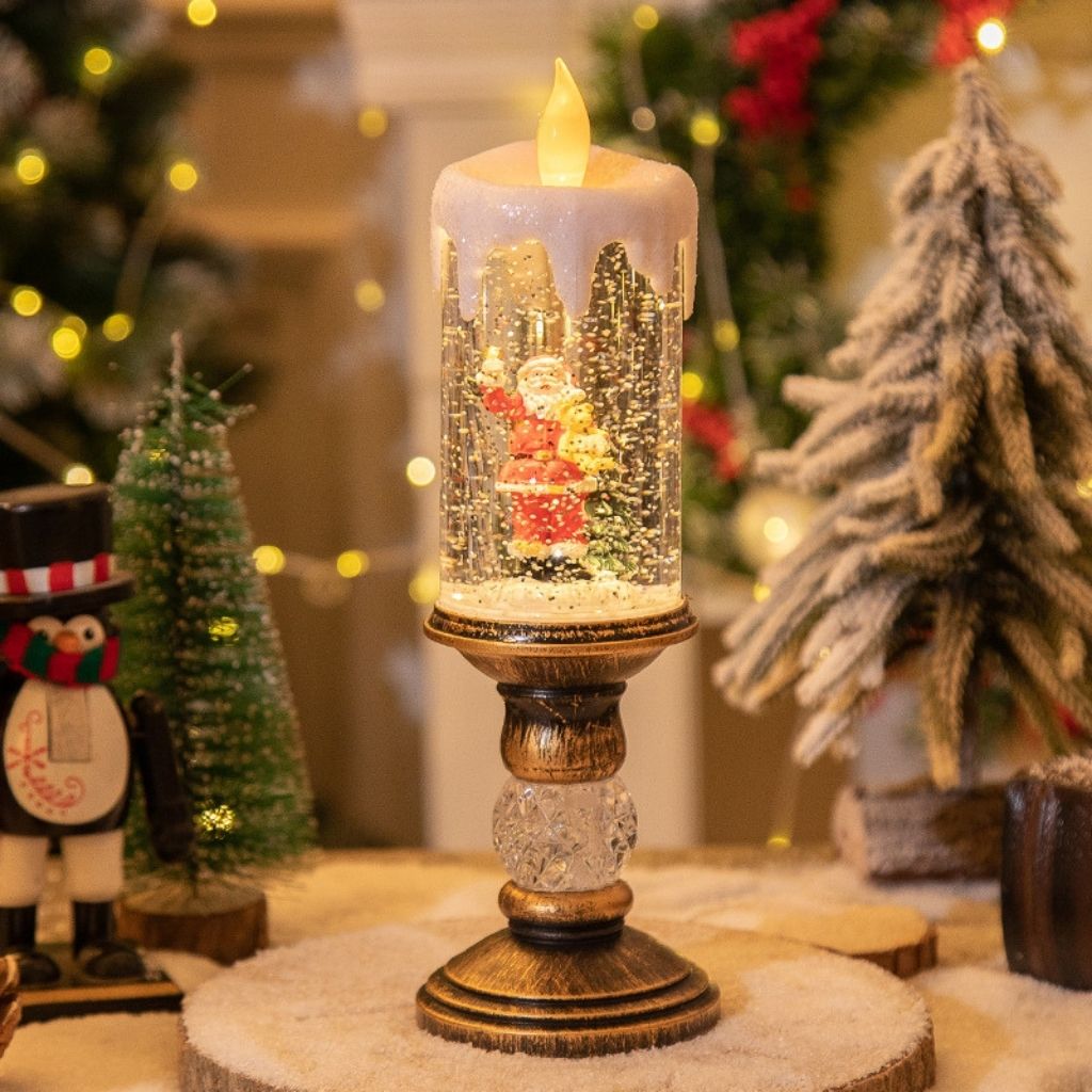 Standing LED lantern with pedestal base and glitter filled winter scene chamber