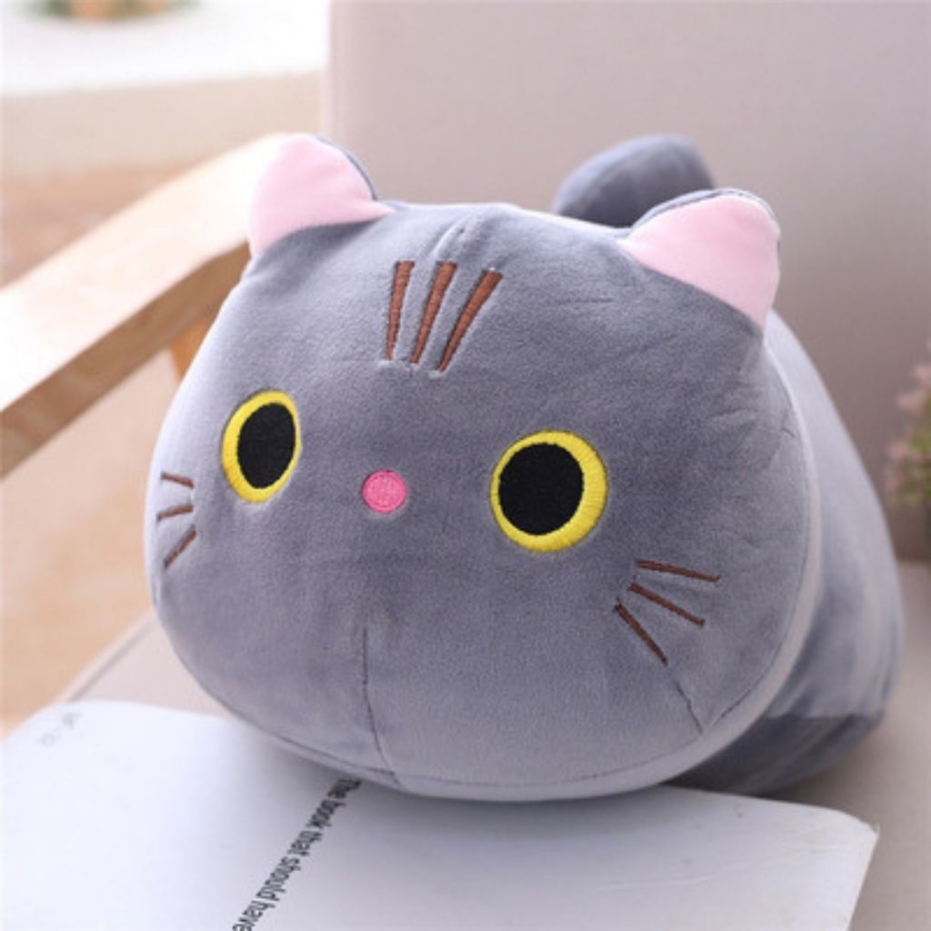 Decorative cat pillow with plush texture offering comfort and adorable home decor accent