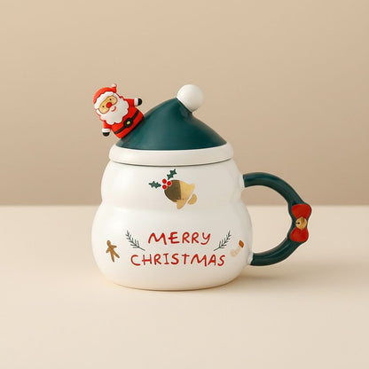 Ceramic mug with festive text and Santa figurine on lid, rounded fit for general use.